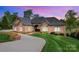 Beautiful single-story brick home with a curved driveway and well-manicured lawn at 89 Wexford Pt, Hickory, NC 28601