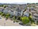 Aerial view of neighborhood featuring a charming blue two-story home with landscaped front yard and inviting front porch at 962 Herrons Ferry Rd, Rock Hill, SC 29730