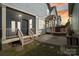 Charming backyard features a screened porch, patio, and well-maintained landscaping at 962 Herrons Ferry Rd, Rock Hill, SC 29730