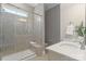 Tiled bathroom with a glass door shower and bright white countertops at 962 Herrons Ferry Rd, Rock Hill, SC 29730