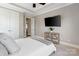 Bright bedroom with tray ceiling, TV, and ample closet space at 962 Herrons Ferry Rd, Rock Hill, SC 29730