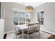 Dining area featuring a large window and chandelier above the dining table at 962 Herrons Ferry Rd, Rock Hill, SC 29730