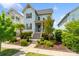 Charming blue two-story home with landscaped front yard and inviting front porch in a suburban setting at 962 Herrons Ferry Rd, Rock Hill, SC 29730