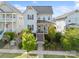 Charming blue two-story home with landscaped front yard and inviting front porch on a sunny day at 962 Herrons Ferry Rd, Rock Hill, SC 29730