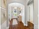 Inviting foyer with hardwood floors, decorative mirrors, and access to other rooms in the home at 962 Herrons Ferry Rd, Rock Hill, SC 29730