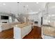 Large kitchen with center island and view into the living room at 962 Herrons Ferry Rd, Rock Hill, SC 29730