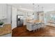 Modern kitchen with a large center island, breakfast bar and stainless steel appliances at 962 Herrons Ferry Rd, Rock Hill, SC 29730