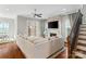 Spacious living room featuring a fireplace, hardwood floors and bright neutral colors at 962 Herrons Ferry Rd, Rock Hill, SC 29730