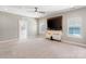 Large living room featuring a media center, built-in cabinets, and bright natural light at 962 Herrons Ferry Rd, Rock Hill, SC 29730
