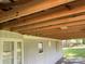View beneath a house with exposed wooden beams and glimpses of the siding and windows at , Salisbury, NC 28147