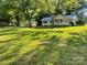 Quaint single-story home with a well-manicured lawn and mature trees providing shade and curb appeal at , Salisbury, NC 28147