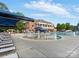 Fantastic community pool area with mushroom fountains and plenty of lounge seating at 1030 Westbury Dr, Matthews, NC 28104