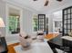 Stylish home office with modern furnishings, neutral decor, and views of the front porch at 1030 Westbury Dr, Matthews, NC 28104