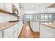 Gourmet kitchen featuring an island, stainless steel appliances, and an open layout at 106 Sweet Briar Dr, Fort Mill, SC 29707