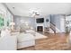 Spacious living room features a fireplace, hardwood floors, and abundant natural light at 106 Sweet Briar Dr, Fort Mill, SC 29707