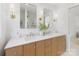 Elegant bathroom boasts dual sinks with marble countertops and stylish fixtures in a modern setting at 1314 Ordermore Ave, Charlotte, NC 28203