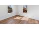 Bright bedroom with hardwood floors and natural light offers a versatile and inviting space at 1314 Ordermore Ave, Charlotte, NC 28203