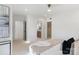 Neutral primary bedroom with a ceiling fan, and en suite bathroom with clean, modern finishes at 1314 Ordermore Ave, Charlotte, NC 28203