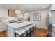 Spacious kitchen showcasing a large central island, stainless steel appliances, and pendant lighting at 1314 Ordermore Ave, Charlotte, NC 28203