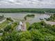 Image displays an aerial view of the townhouses that features a lovely waterfront location at 1404 River Dr, Belmont, NC 28012