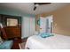 Comfortable bedroom with hardwood floors, ample closet space, and a calming color scheme at 1404 River Dr, Belmont, NC 28012