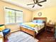 Cozy bedroom with natural light, comfortable bed, and a calming atmosphere for restful nights at 1404 River Dr, Belmont, NC 28012