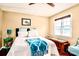 Comfortable bedroom with natural light, cozy bed, and stylish decor for a relaxing ambiance at 1404 River Dr, Belmont, NC 28012