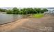 Concrete boat ramp provides access to lake, perfect for recreational activities and water adventures at 1404 River Dr, Belmont, NC 28012