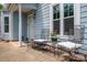 Cozy front porch with comfortable seating, perfect for enjoying the outdoors at 1404 River Dr, Belmont, NC 28012