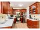 Well-equipped kitchen featuring stainless steel appliances, ample cabinet space, and stylish countertops at 1404 River Dr, Belmont, NC 28012