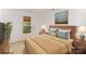 Bedroom with a tan bedspread, bedside tables and a window with blinds at 14311 Riding Hill Ave, Charlotte, NC 28213