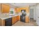 Efficient kitchen has stainless steel appliances and plenty of counter space at 14311 Riding Hill Ave, Charlotte, NC 28213