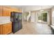 This eat-in kitchen has stainless steel appliances and plenty of cabinets at 14311 Riding Hill Ave, Charlotte, NC 28213
