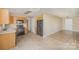 Open concept kitchen layout with eat in area and ample counter space at 14311 Riding Hill Ave, Charlotte, NC 28213
