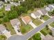 Aerial view of a well-planned neighborhood with homes, trees, and manicured lawns at 1680 Beleek Ridge Ln, Clover, SC 29710