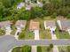 An aerial shot showcases this home nestled within a leafy residential area at 1680 Beleek Ridge Ln, Clover, SC 29710
