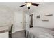 Bright, carpeted bedroom with overhead lighting, shelves, a window, and decorative wallpaper at 1680 Beleek Ridge Ln, Clover, SC 29710