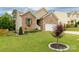 Charming home with well-manicured lawn and beautiful landscaping at 1680 Beleek Ridge Ln, Clover, SC 29710