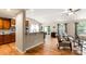 Spacious living area with hardwood floors, natural light, and open layout to kitchen at 1680 Beleek Ridge Ln, Clover, SC 29710