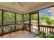 Cozy screened-in porch with outdoor furniture, a ceiling fan, and views of the backyard at 1680 Beleek Ridge Ln, Clover, SC 29710