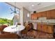 Bright kitchen features stainless steel appliances, granite countertops, and a breakfast area with an outside view at 2200 Lyndhurst Ave # 203, Charlotte, NC 28203