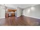Open-concept kitchen boasts stainless steel appliances and wood cabinetry at 2200 Lyndhurst Ave # 203, Charlotte, NC 28203