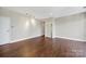 Spacious room with hardwood floors is bathed in natural light and is ready to be furnished at 2200 Lyndhurst Ave # 203, Charlotte, NC 28203