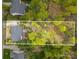 Expansive aerial view showing the property, the home's position on the lot, and outdoor features, including the fire pit at 2620 Shady Reach Ln, Charlotte, NC 28214