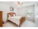 Cozy bedroom featuring a wooden bed frame and soft, neutral decor at 2620 Shady Reach Ln, Charlotte, NC 28214