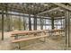 Community pavilion with picnic tables, providing an outdoor gathering spot with views of the lake at 2620 Shady Reach Ln, Charlotte, NC 28214