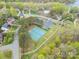 Aerial view of neighborhood tennis courts, offering residents an outdoor activity space at 2620 Shady Reach Ln, Charlotte, NC 28214