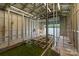 Interior of boathouse showing lift, lighting, and access to the water, ideal for boat storage at 273 Leeward Point Loop # 14, Taylorsville, NC 28681