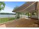 Inviting covered deck with awning and views of the lake at 273 Leeward Point Loop # 14, Taylorsville, NC 28681