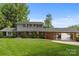 Landscaped front lawn with a large two story home at 273 Leeward Point Loop # 14, Taylorsville, NC 28681